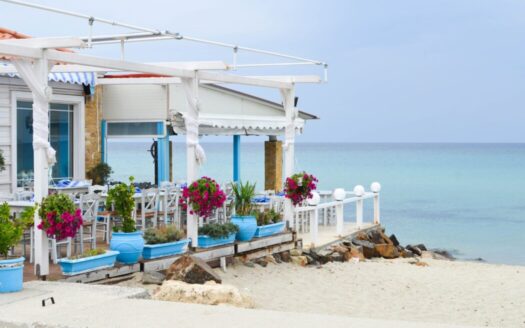 Greek vacation home with sea view illustrating property taxes on vacation homes in Greece in 2025.