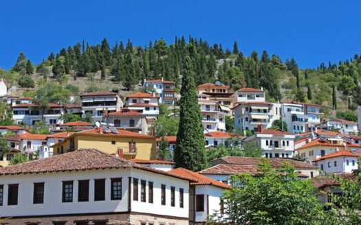 Traditional stone house in Greece with historic architecture, ideal for property investors