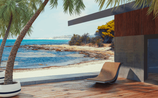 Seaside villa in Greece with stunning views of the ocean, showcasing a renovated property with traditional and modern design elements.