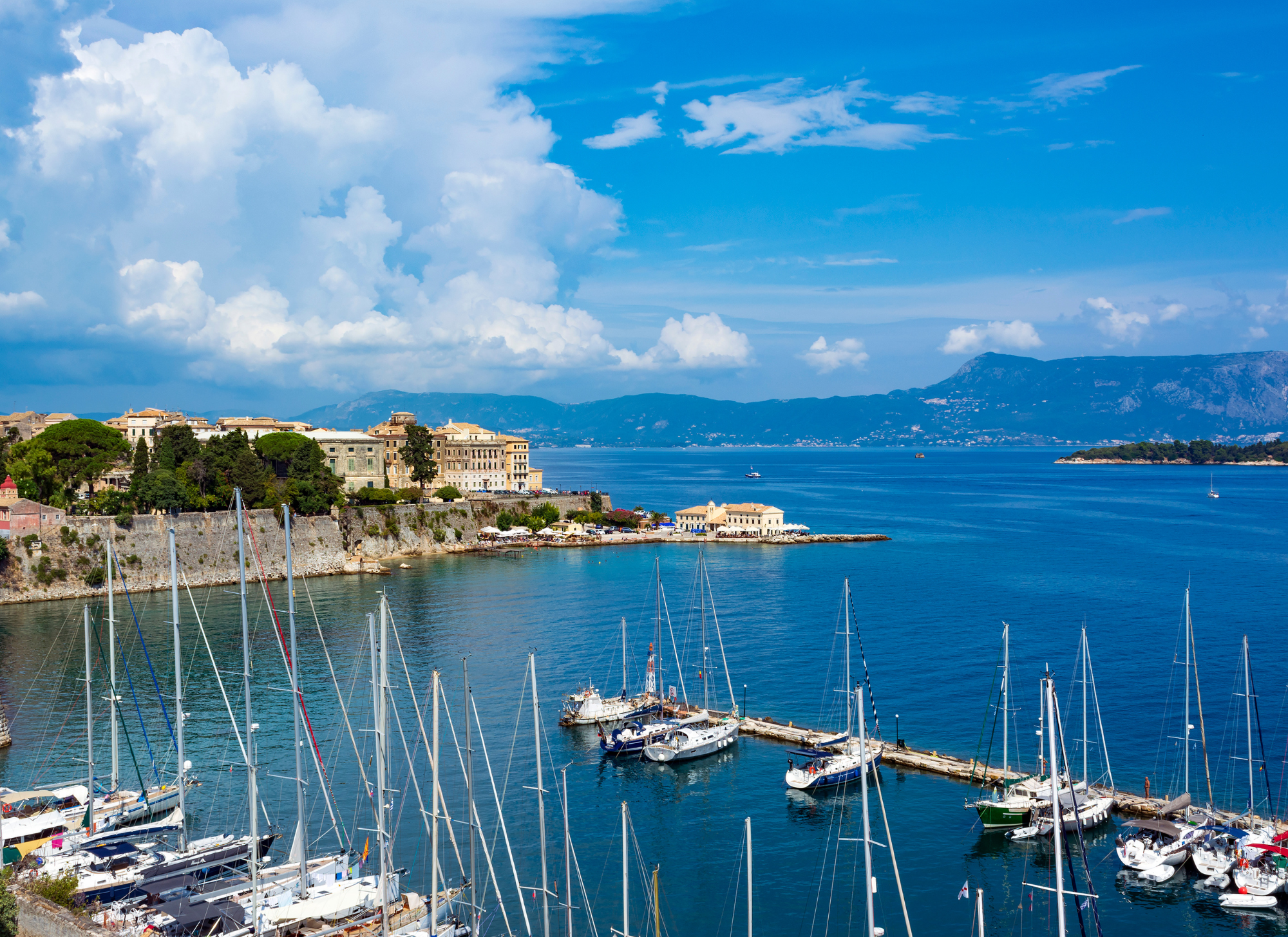 A picturesque coastal view of Corfu, ideal for a vacation home, showcasing scenic landscapes and real estate opportunities.