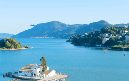 A scenic view of Kassiopi, one of Corfu’s underrated real estate gems, offering picturesque landscapes and investment potential.