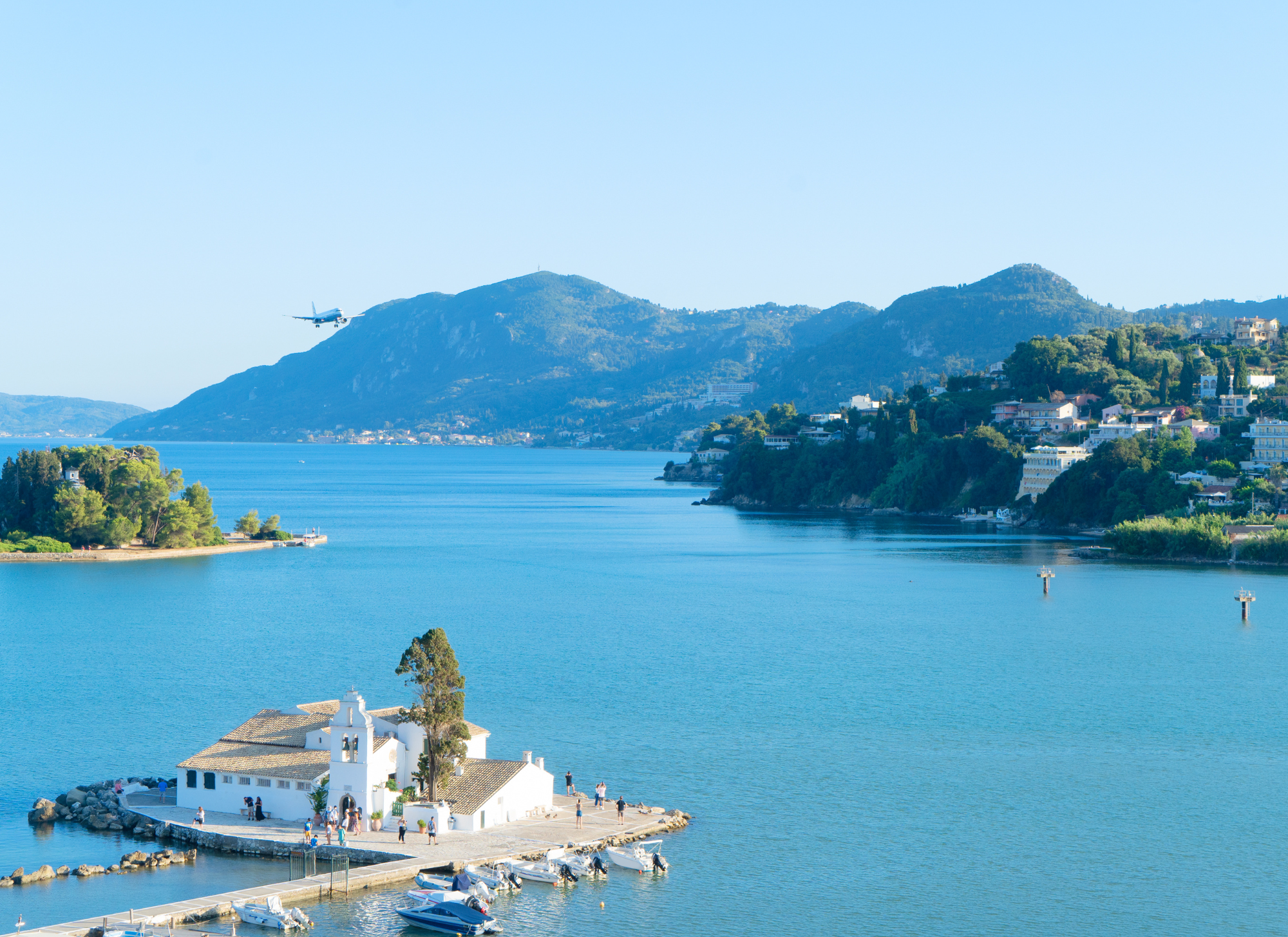 A scenic view of Kassiopi, one of Corfu’s underrated real estate gems, offering picturesque landscapes and investment potential.