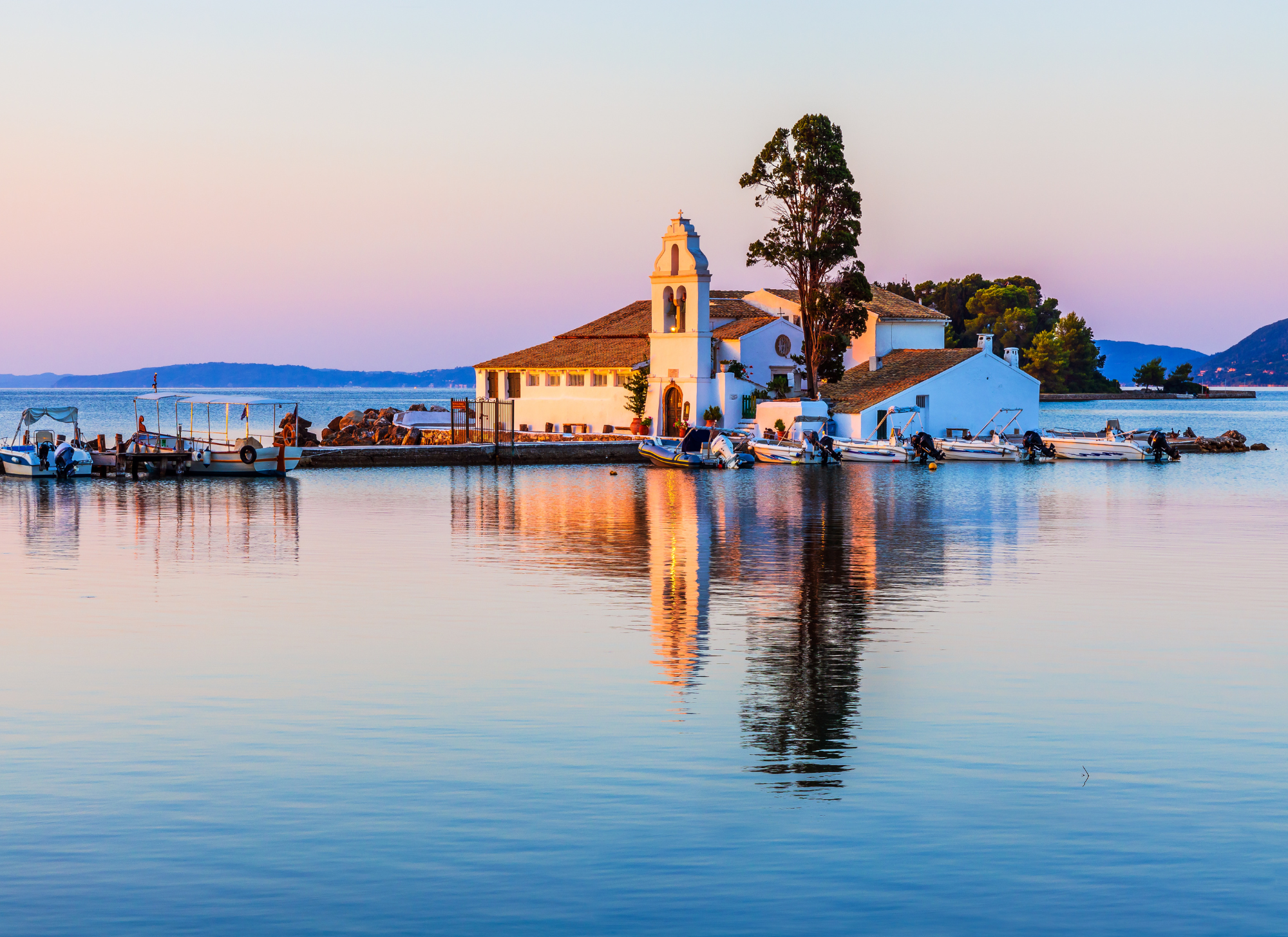 Stunning view of Corfu’s coastal real estate developments, featuring luxury villas and sustainable homes overlooking the Mediterranean.