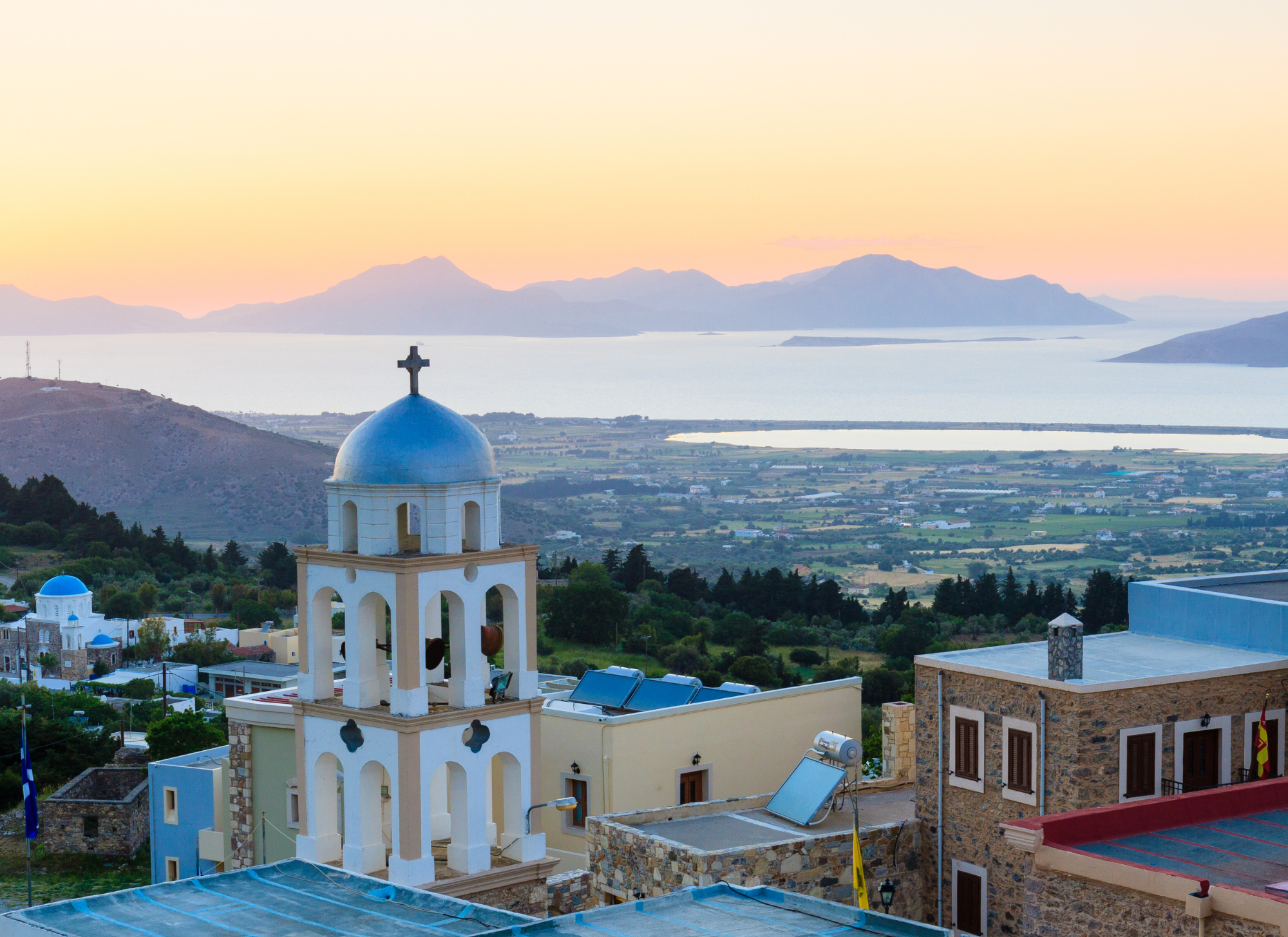 Affordable holiday homes on scenic Greek islands with sea views, perfect for 2025 buyers.