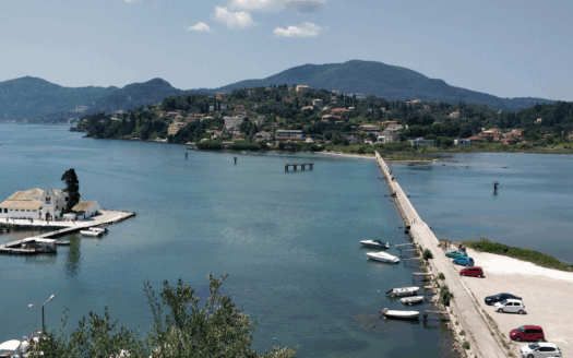 A picturesque view of Perama, Corfu, showing the beautiful coastal landscape and traditional Greek village charm.
