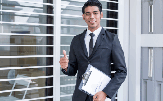 Beginner real estate investor analyzing properties and deciding on the best investment strategy.