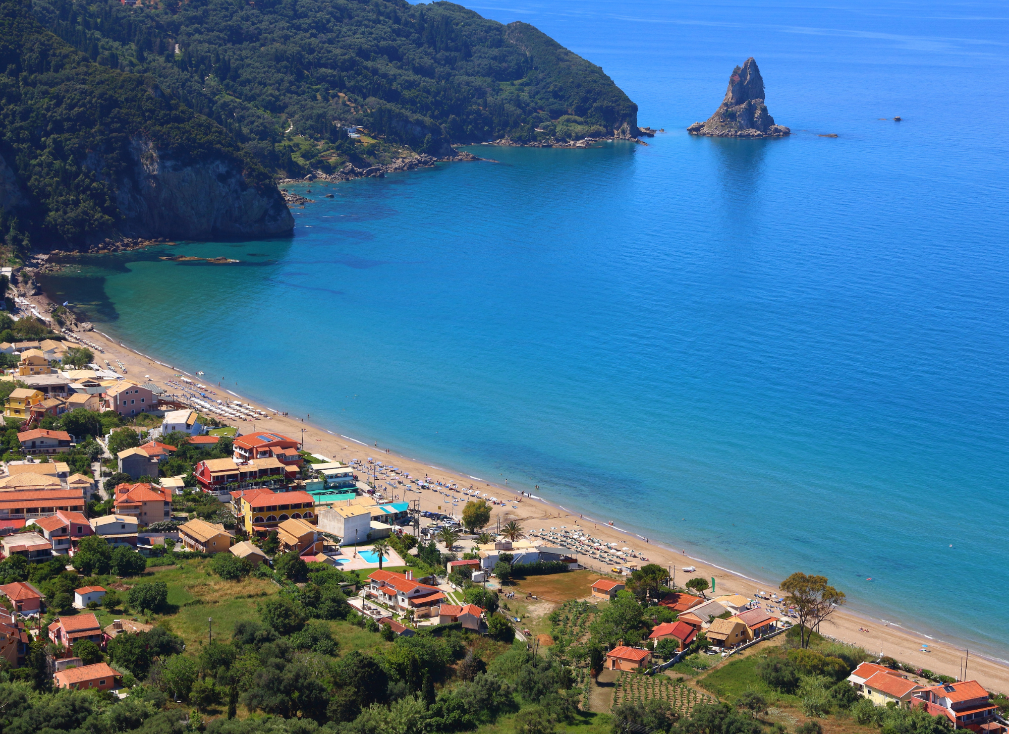 A scenic land plot in Corfu ready for building a dream home, with views of the island’s natural beauty.
