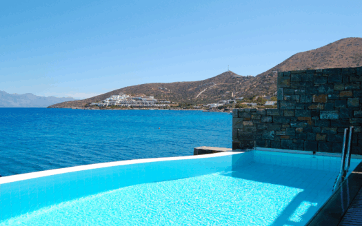 A luxury villa in Greece with panoramic sea views and modern architectural design.
