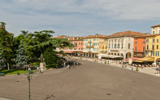 Café culture in Liston Square, Corfu, with Venetian-style arcades.