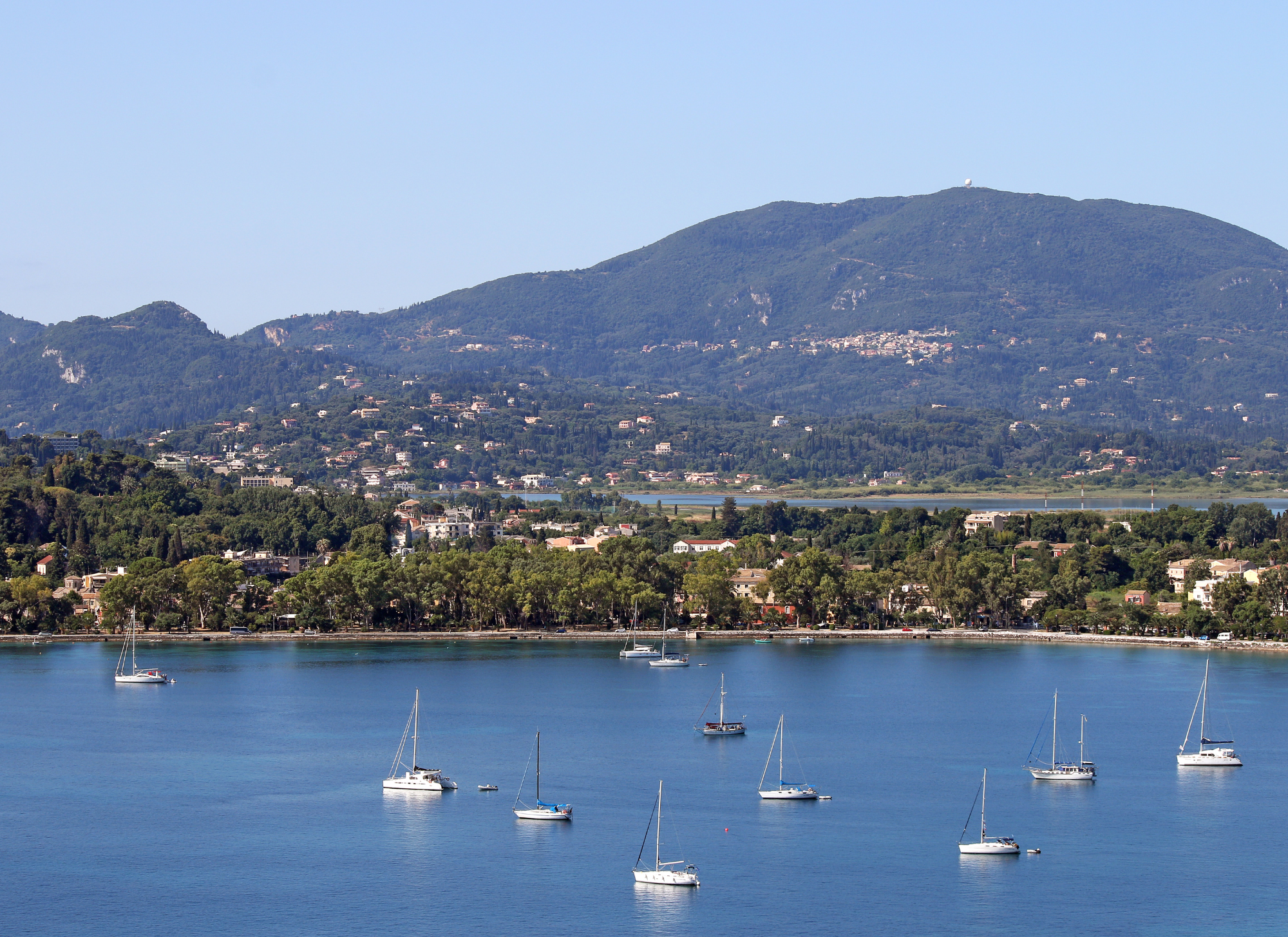 View of Garitsa Bay in Corfu Town with the sea in the background.