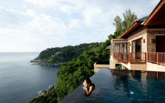 Traditional Corfiot villa with stone walls and a central courtyard.