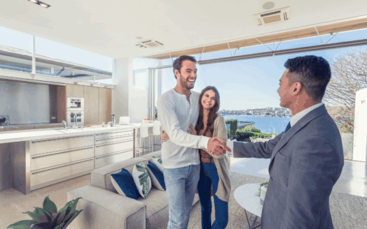 Real estate agent helping an international buyer find a villa in Corfu.