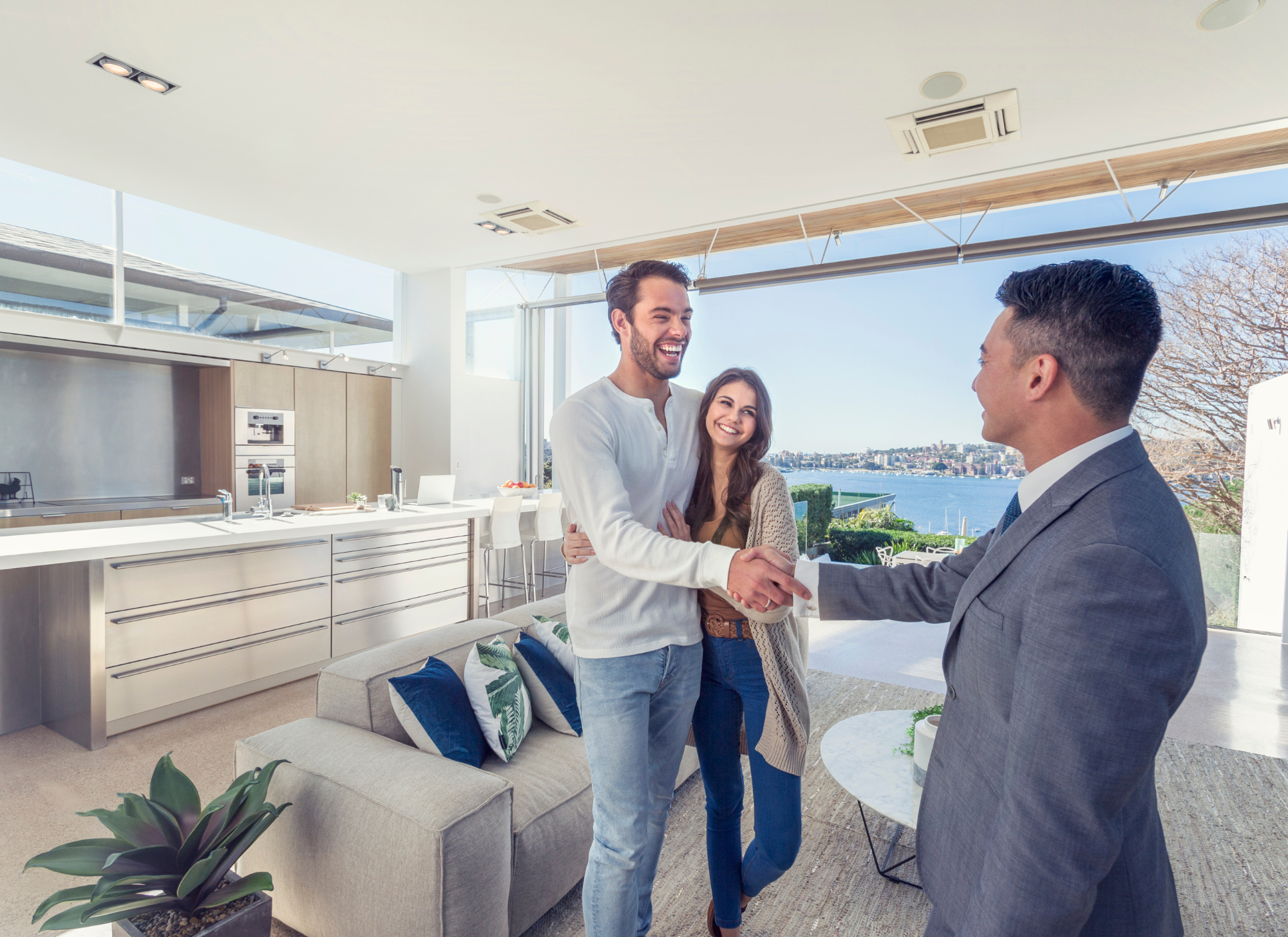 Real estate agent helping an international buyer find a villa in Corfu.