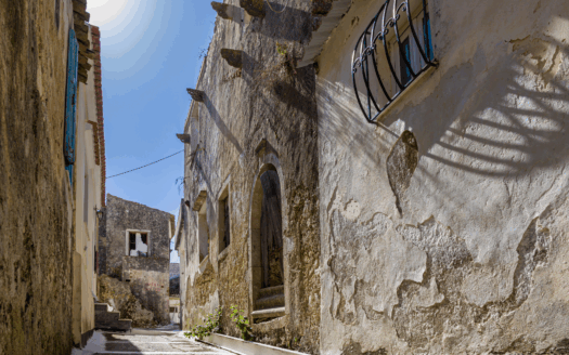 Pelekas village with its traditional Greek charm, offering a quiet, family-oriented environment