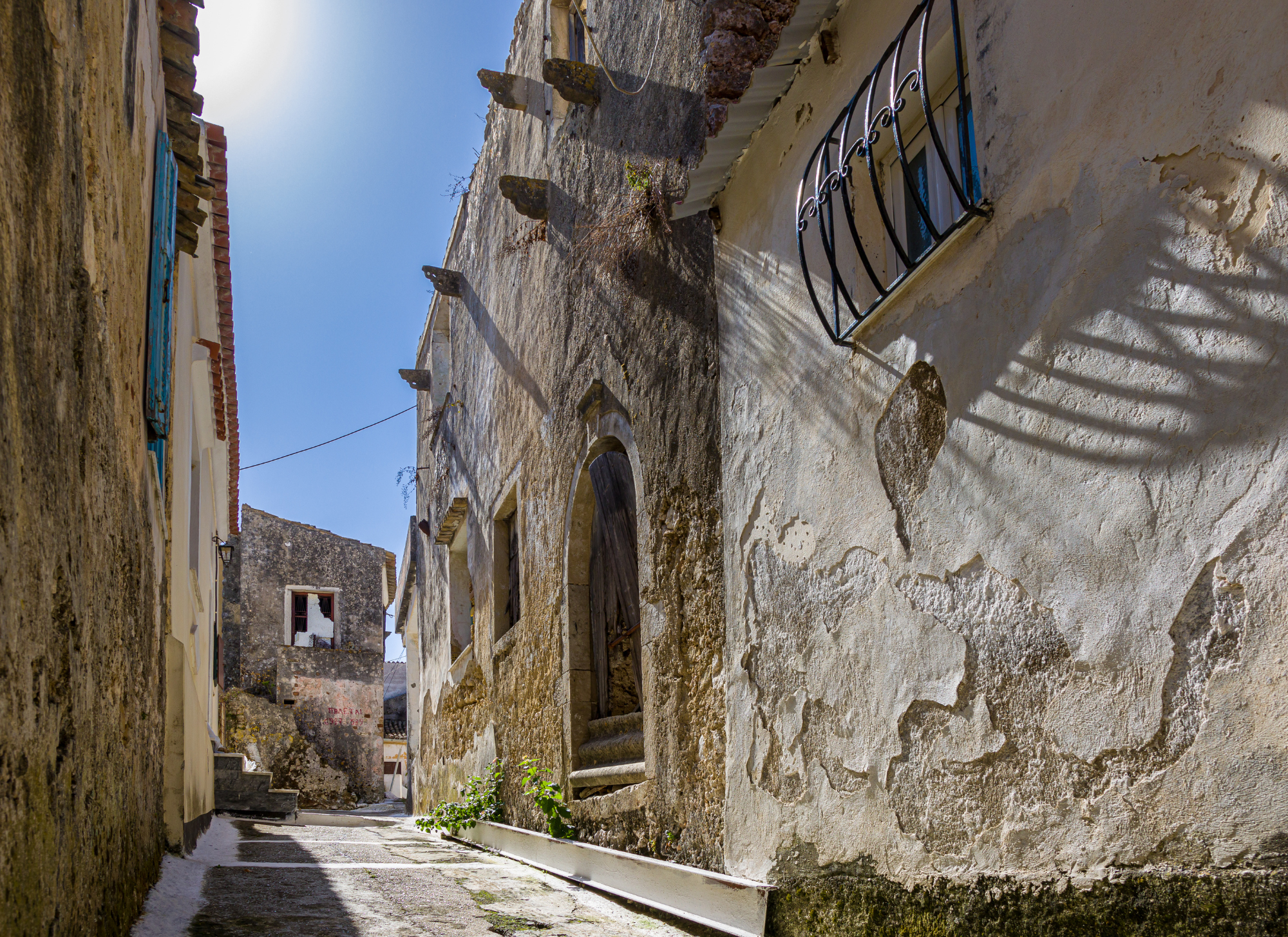 Pelekas village with its traditional Greek charm, offering a quiet, family-oriented environment