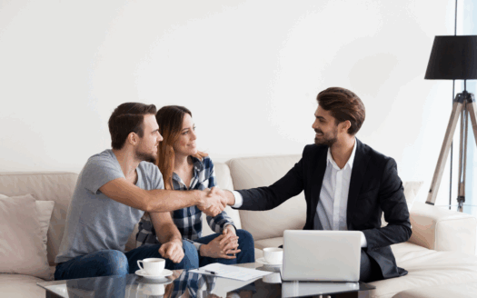 Real estate agent showing Corfu home options to a client.