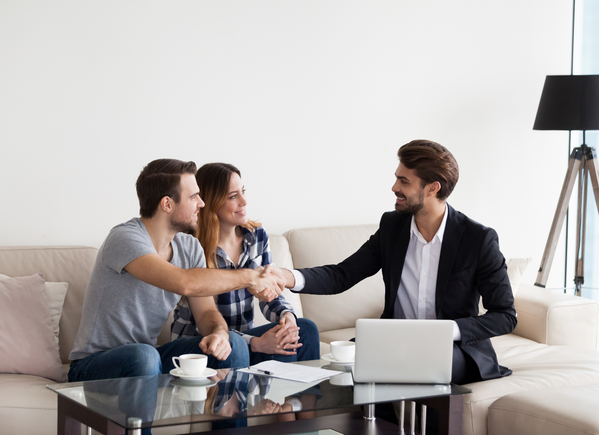 Real estate agent showing Corfu home options to a client.