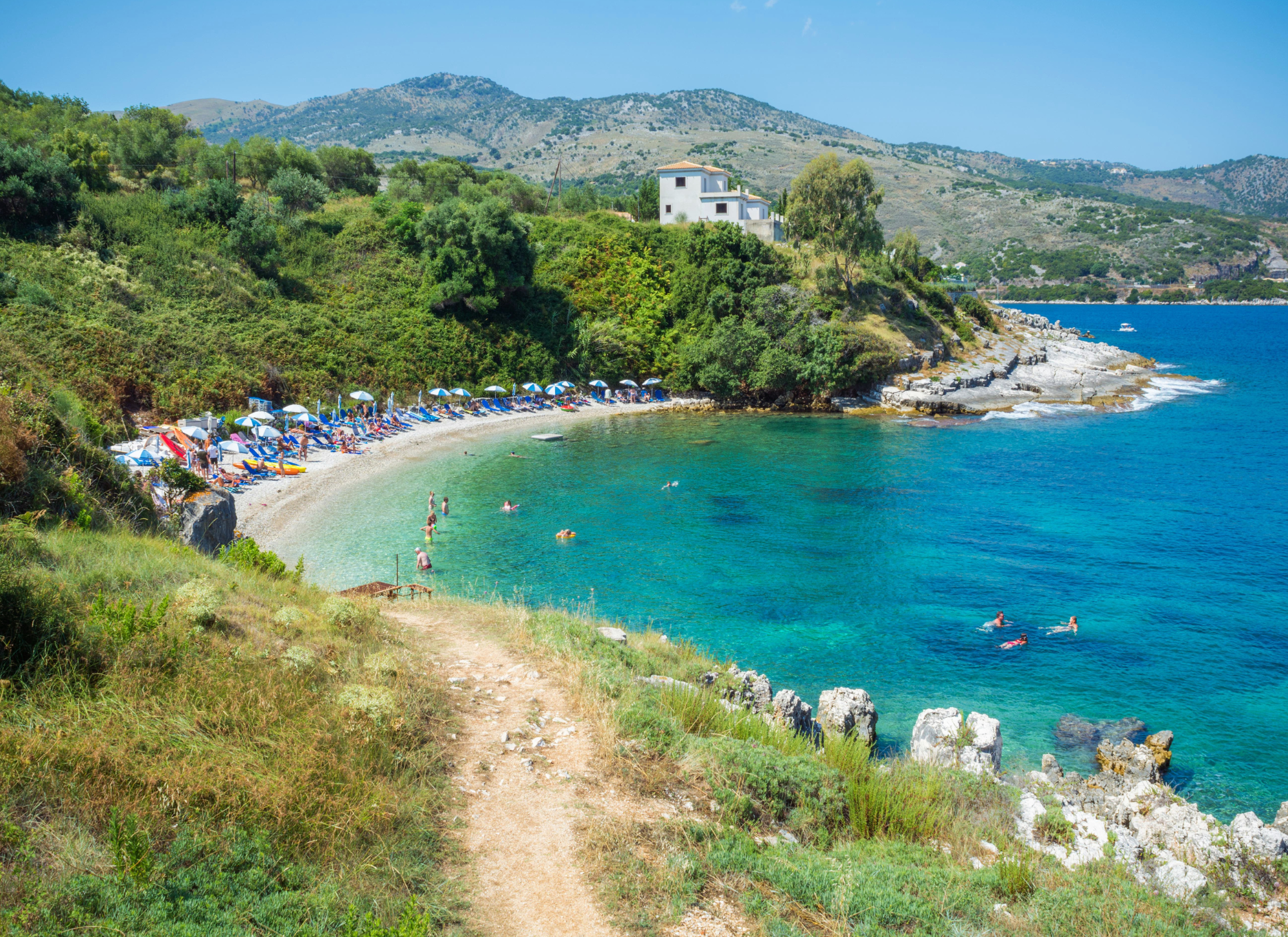 Aerial view of Kassiopi Corfu and its crystal-clear beaches