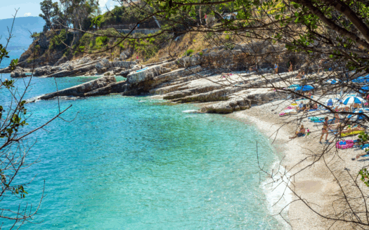 Kassiopi beach in Sidari Corfu with properties in the background