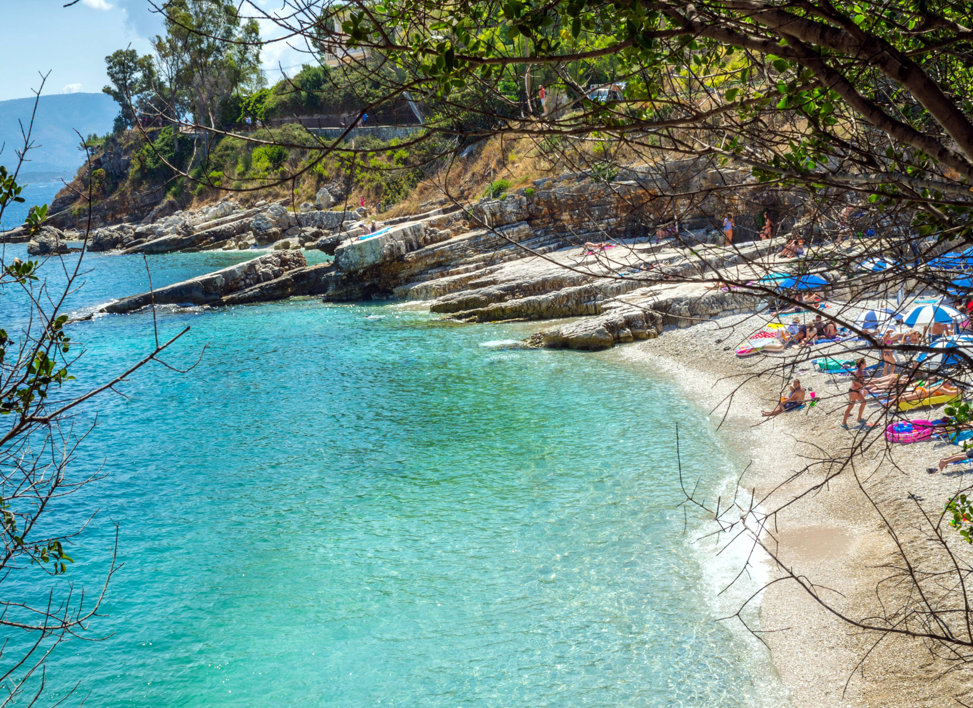 Kassiopi beach in Sidari Corfu with properties in the background