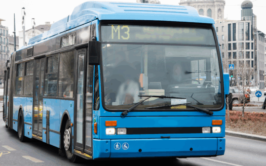 Passengers boarding a Corfu Green Bus near the port