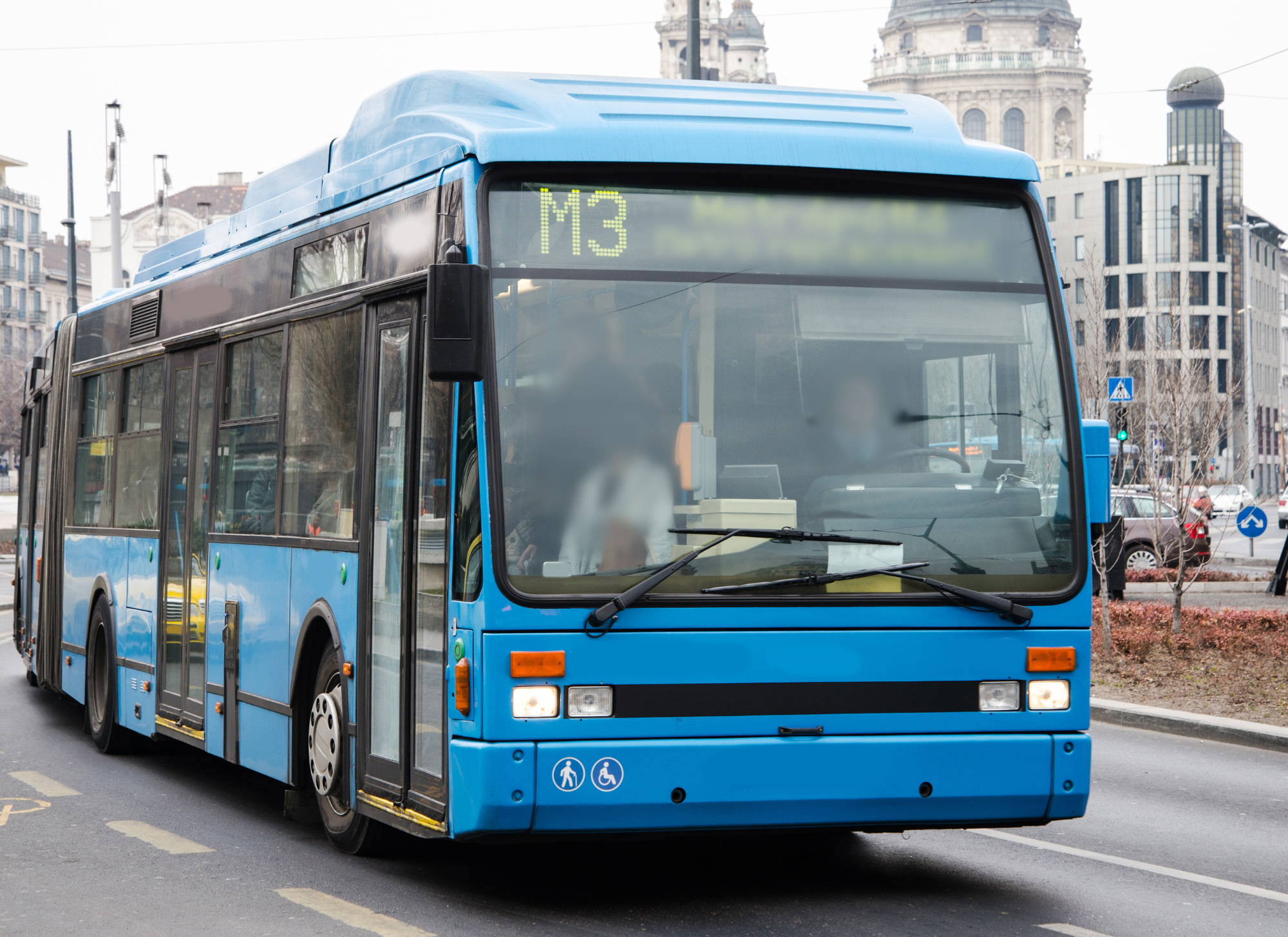 Passengers boarding a Corfu Green Bus near the port