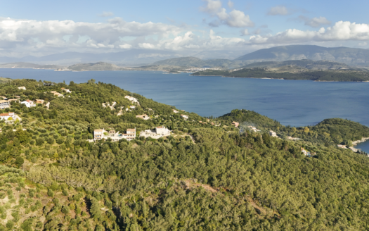 Elevated Sea-View Plot in Sinies Below the Main Road