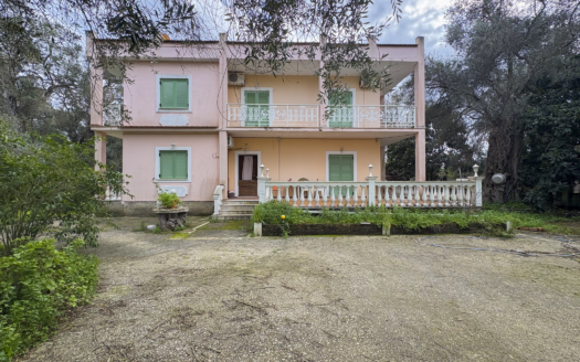 Renovated 3-Bedroom Home with Two Upper Apartments in Lefkimmi