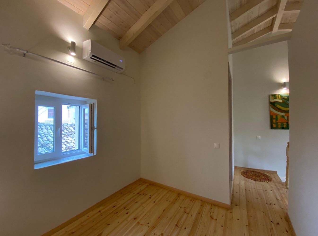 Listing photograph 2 of 15 of the house in Sinarades, published by Chase Real Estate Corfu.