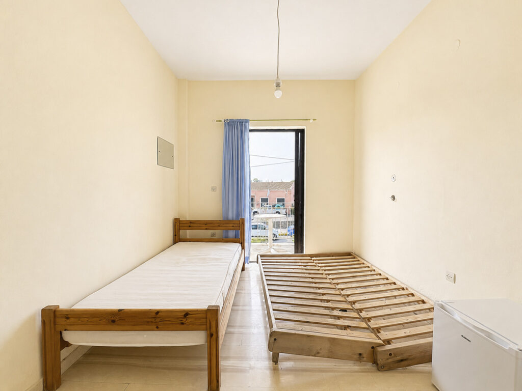 Investment Building with 12 Rooms and Renovated Apartment in Ipsos, Corfu €635,000 (20)